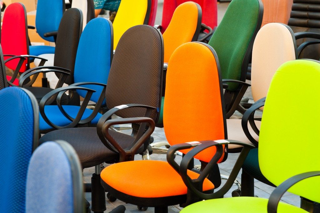 Multi-colored office chairs in a shop