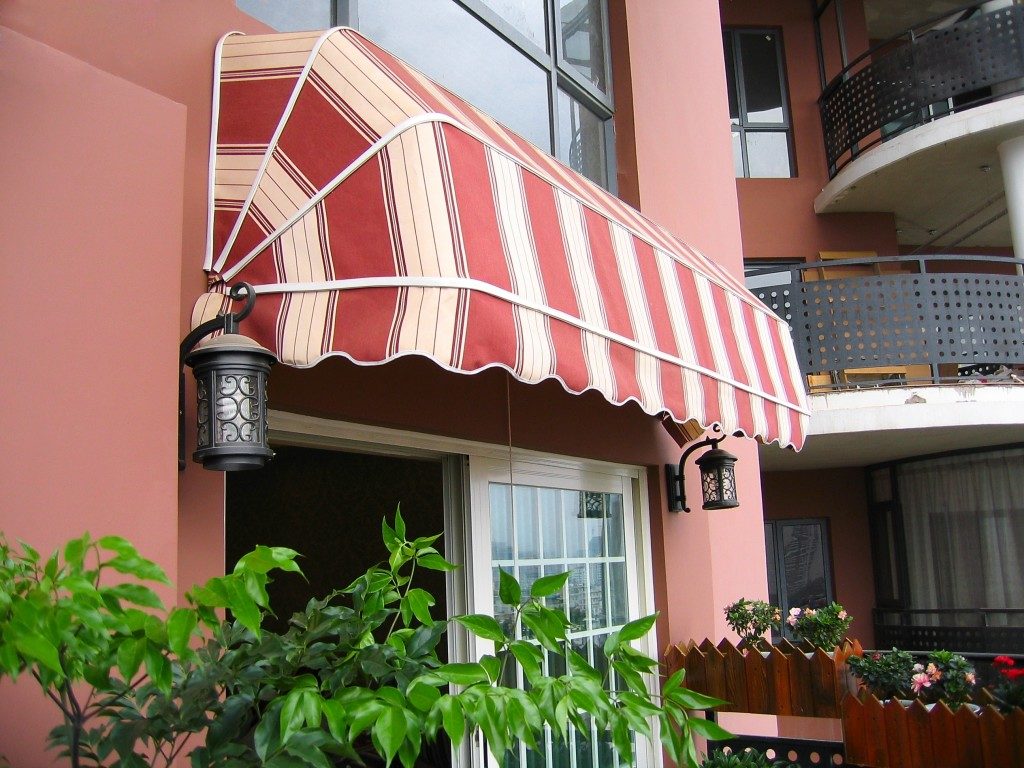 white and red awning at the balcony 