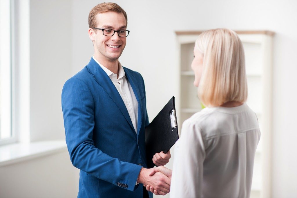 Woman consulting a realtor
