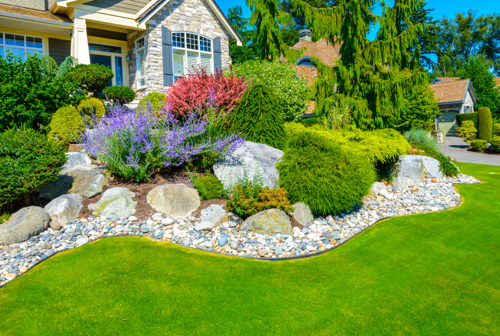 Flowers and stones in front of the house, front yard