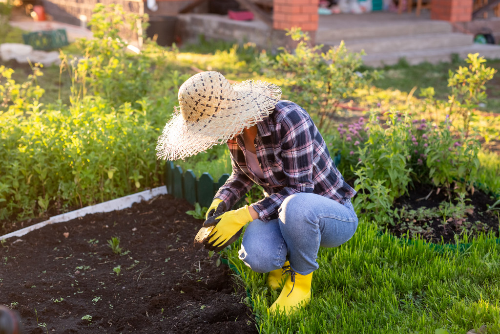 A person gardening in their backyard