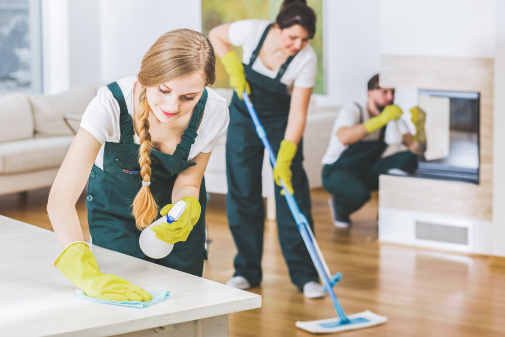 A professional cleaning service cleaning the whole house